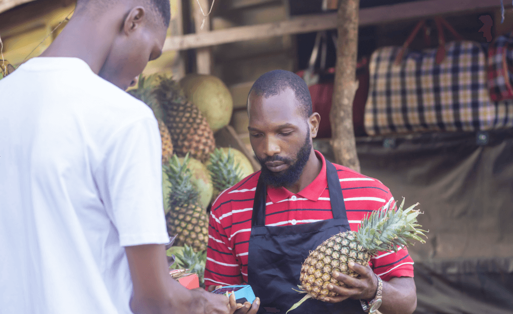 Market vendor with asset-financed equipment Nigeria