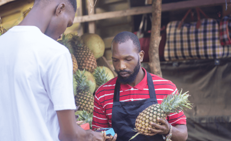 Market vendor with asset-financed equipment Nigeria