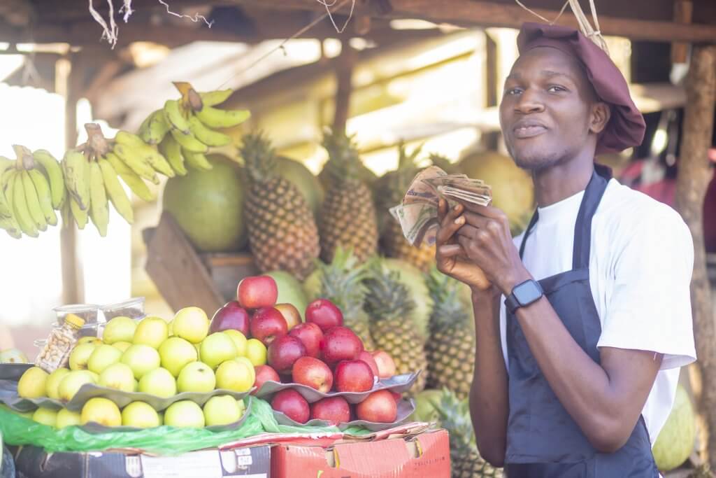 Market vendor with asset-financed equipment Nigeria