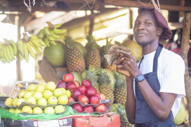 Market vendor with asset-financed equipment Nigeria